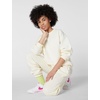 Nike Unisex Big Kids’ Sportswear Club Fleece Loose Pants – Boys and Girls(Soft Pearl/Soft Pearl/White)