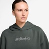 Nike Women’s Basketball Oversized Pullover Hoodie(Camo Green/Pure Platinum)