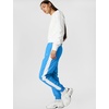 Nike Women’s Sportswear Classic Woven Protection UV Mid-Rise Loose Joggers(Light Photo Blue/White/Sail)