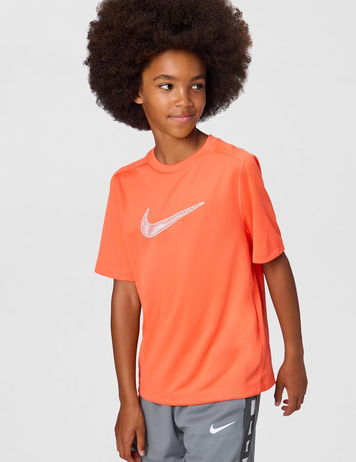 image:imageNike Unisex Big Kids Multi DriFIT ShortSleeve Training Top Large Swoosh Logo Boys and GirlsTurf OrangeWhite