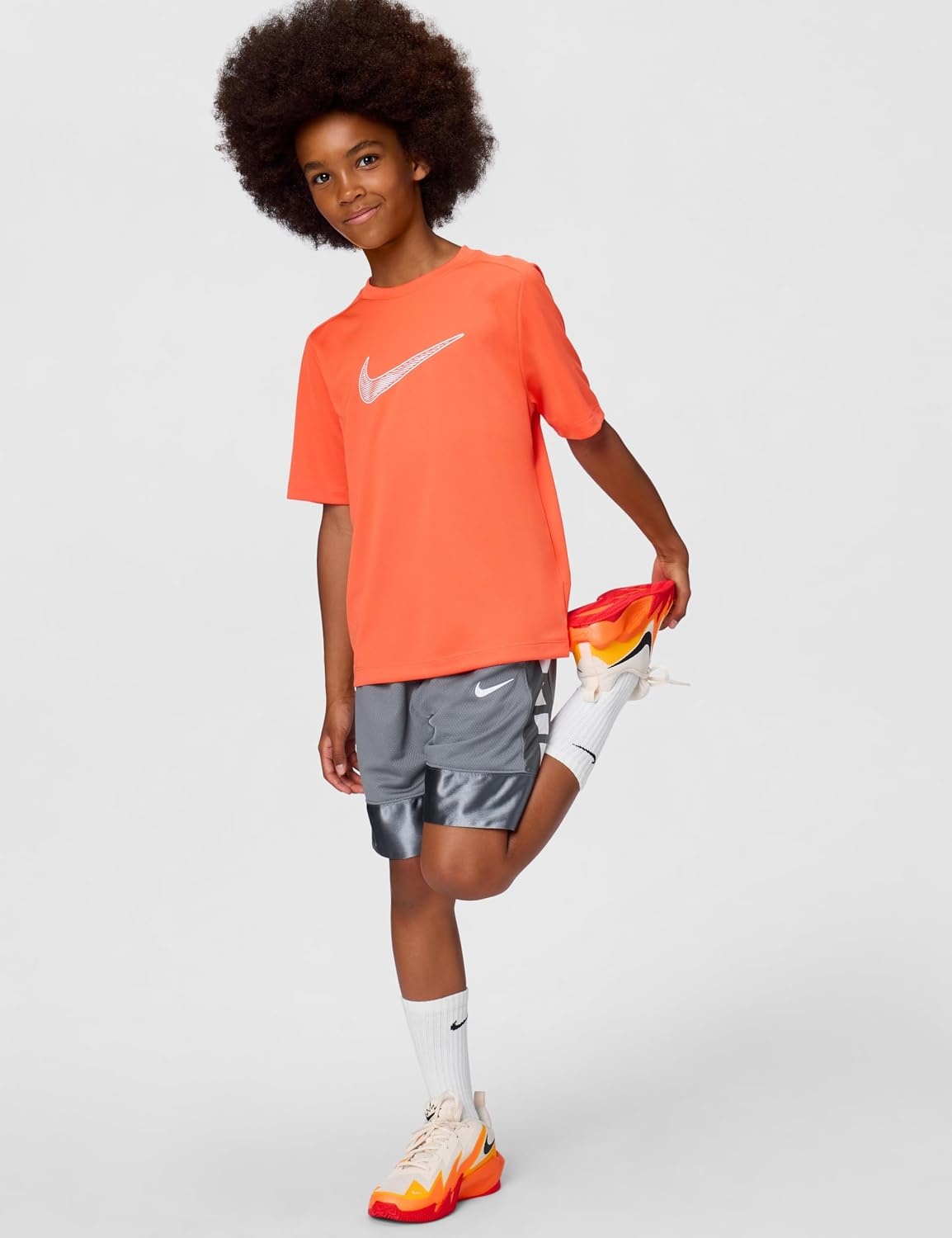 image:imageNike Unisex Big Kids Multi DriFIT ShortSleeve Training Top Large Swoosh Logo Boys and GirlsTurf OrangeWhite
